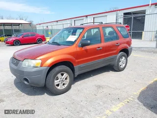 2007 Ford Escape XLS with VIN 1FMYU02Z27KA04600, listed as a IAAI auction lot 42059639 with 141,296 mi miles. Bid and sale history available at carsss.com. Image 2.