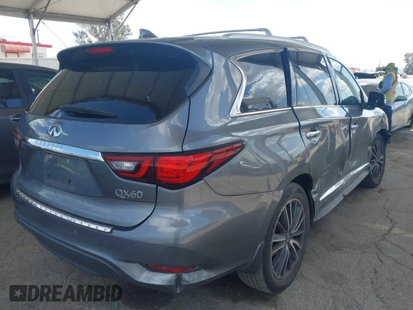 2019 Infiniti QX60 Pure z VIN 5N1DL0MN3KC565998, wystawiony jako IAAI lot #41911130 z przebiegiem 79 463 mil mil oraz . Historia ofert i sprzedaży dostępna na DreamBid. Obrazek 4.