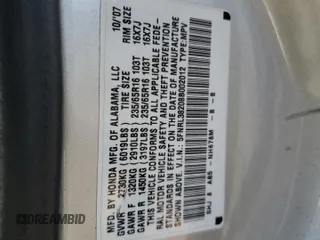2008 Honda Odyssey LX z VIN 5FNRL38208B002012, wystawiony jako Copart lot #77695074 z przebiegiem 207 184 mil mil oraz Czysty tytuł • Clean title. Historia ofert i sprzedaży dostępna na DreamBid. Obrazek 13.