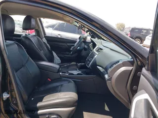 2017 Nissan Altima 2.5 SR with VIN 1N4AL3AP9HC151928, listed as a IAAI auction lot 42020334 with 136,101 mi miles. Bid and sale history available at carsss.com. Image 5.