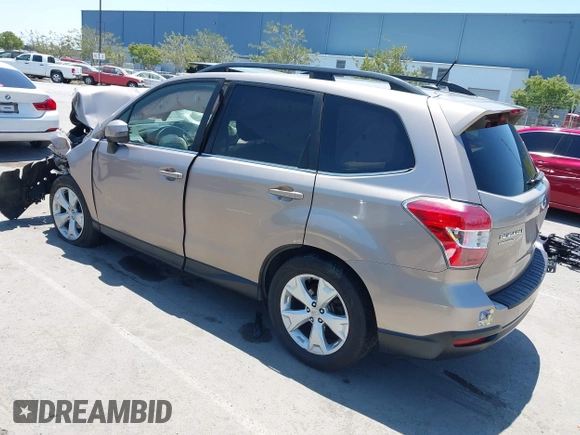 2014 Subaru Forester Touring with VIN JF2SJAPC3EH558690, listed as a IAAI auction lot 42588000 with 151,065 mi miles and . Bid and sale history available at DreamBid. Image 3.