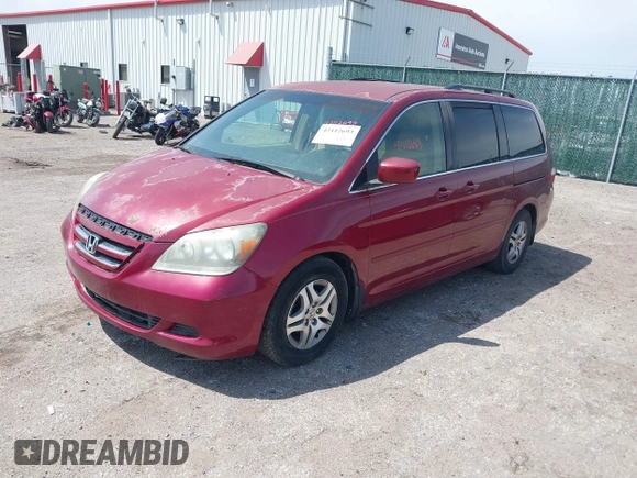 2006 Honda Odyssey EX with VIN 5FNRL38456B113072, listed as a IAAI auction lot 42112693 with 238,883 mi miles. Bid and sale history available at carsss.com. Image 2.