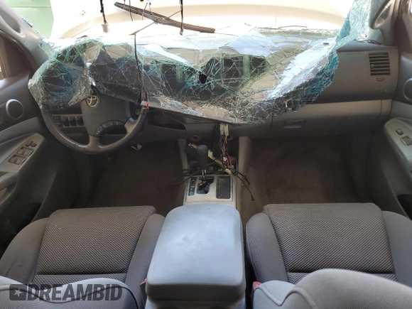 2005 Toyota Tacoma with VIN 3TMMU52N65M001833, listed as a Copart auction lot 62111395 with Not provided miles and Salvage title. Bid and sale history available at DreamBid. Image 8.