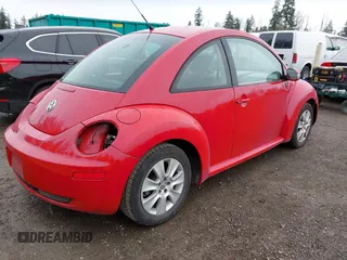 2009 Volkswagen New Beetle Coupe S with VIN 3VWPG31C99M512447, listed as a IAAI auction lot 41924303 with 136,898 mi miles. Bid and sale history available at carsss.com. Image 4.