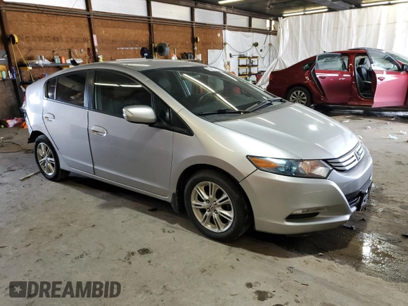 2010 Honda Insight EX with VIN JHMZE2H76AS021610, listed as a Copart auction lot 62992225 with 162,974 mi miles and Salvage title. Bid and sale history available at DreamBid. Image 4.