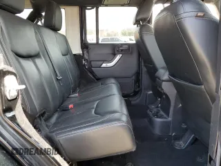 2016 Jeep Wrangler Unlimited Rubicon with VIN 1C4HJWFG4GL107777, listed as a Copart auction lot 48974135 with 118,164 mi miles and Salvage Title. Bid and sale history available at carsss.com. Image 12.