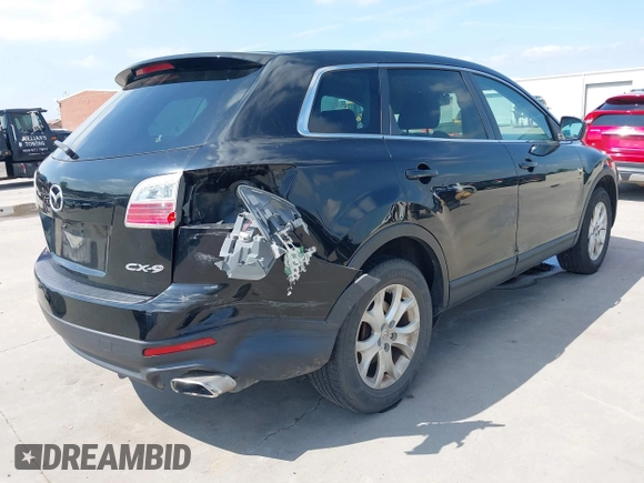 2011 Mazda CX-9 Sport with VIN JM3TB2BA7B0303120, listed as a IAAI auction lot 42427053 with 219,673 mi miles and . Bid and sale history available at DreamBid. Image 4.