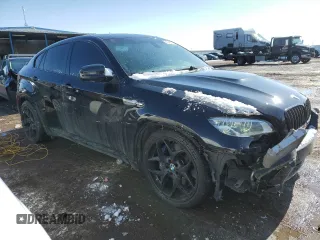 2014 BMW X6 M with VIN 5YMGZ0C50E0C40694, listed as a Copart auction lot 43943305 with 124,104 mi miles and Salvage Title. Bid and sale history available at carsss.com. Image 4.