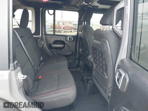 2020 Jeep Wrangler Unlimited Rubicon z VIN 1C4HJXFG7LW193665, wystawiony jako IAAI lot #41874930 z przebiegiem 58 884 mil mil oraz . Historia ofert i sprzedaży dostępna na DreamBid. Obrazek 8.