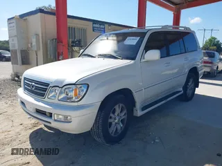2003 Lexus LX 470 with VIN JTJHT00WX33523623, listed as a IAAI auction lot 42028889 with 317,700 mi miles and . Bid and sale history available at DreamBid. Image 17.