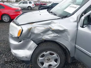 2012 Honda Pilot EX-L with VIN 5FNYF4H71CB053886, listed as a IAAI auction lot 41658180 with 140,541 mi miles and . Bid and sale history available at DreamBid. Image 6.