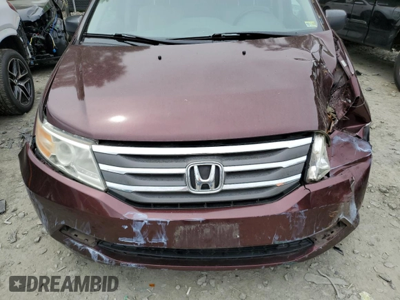 2011 Honda Odyssey LX z VIN 5FNRL5H29BB057920, wystawiony jako Copart lot #56433905 z przebiegiem 143 551 mil mil oraz Szkoda całkowita • Salvage title. Historia ofert i sprzedaży dostępna na DreamBid. Obrazek 12.