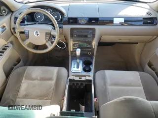2005 Mercury Montego Luxury z VIN 1MEFM40125G601261, wystawiony jako Copart lot #88334305 z przebiegiem Nie podano mil oraz Szkoda całkowita • Salvage title. Historia ofert i sprzedaży dostępna na DreamBid. Obrazek 8.