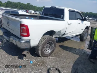 2019 Ram 2500 Lone Star with VIN 3C6UR5DL0KG590912, listed as a IAAI auction lot 42669594 with 128,789 mi miles and . Bid and sale history available at DreamBid. Image 4.