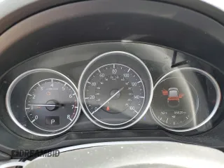 2018 Mazda CX-5 Grand Touring z VIN JM3KFADM2J1381752, wystawiony jako Copart lot #56889835 z przebiegiem 96 820 mil mil oraz Szkoda całkowita • Salvage title. Historia ofert i sprzedaży dostępna na DreamBid. Obrazek 9.