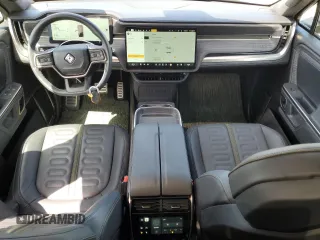 2023 Rivian R1S Adventure z VIN 7PDSGBBA5PN024306, wystawiony jako Copart lot #53980375 z przebiegiem 10 389 mil mil oraz Szkoda całkowita • Salvage title. Historia ofert i sprzedaży dostępna na DreamBid. Obrazek 8.