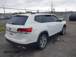 2023 Volkswagen Atlas SE with VIN 1V2KP2CA9PC556898, listed as a IAAI auction lot 40714688 with 53,598 mi miles and . Bid and sale history available at DreamBid. Image 4.