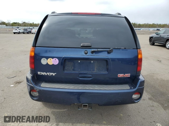 2004 GMC Envoy SLT with VIN 1GKDT13S242201036, listed as a Copart auction lot 50698255 with 152,575 mi miles and Salvage Title. Bid and sale history available at carsss.com. Image 6.