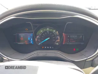 2013 Ford Fusion SE Hybrid with VIN 3FA6P0LU4DR337674, listed as a IAAI auction lot 42164262 with 150,902 mi miles and . Bid and sale history available at carsss.com. Image 7.