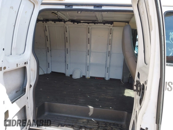 2020 Chevrolet Express Cargo Van with VIN 1GCWGBFP8L1120262, listed as a IAAI auction lot 42010679 with 114,589 mi miles. Bid and sale history available at carsss.com. Image 8.