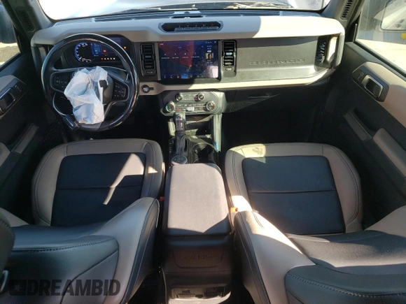 2023 Ford Bronco z VIN 1FMEE5DP0PLB62405, wystawiony jako Copart lot #48457335 z przebiegiem 56 998 mil mil oraz Szkoda całkowita • Salvage title. Historia ofert i sprzedaży dostępna na DreamBid. Obrazek 8.