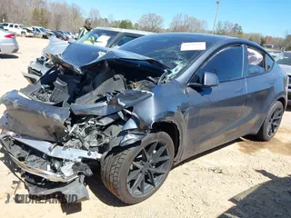 2022 Tesla Model Y Long Range with VIN 7SAYGDEE0NF387512, listed as a IAAI auction lot 41850901 with Not Provided miles and . Bid and sale history available at carsss.com. Image 17.