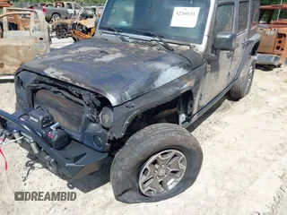 2016 Jeep Wrangler Unlimited Rubicon Hard Rock with VIN 1C4BJWFG6GL265320, listed as a IAAI auction lot 42260151 with Not provided miles and . Bid and sale history available at DreamBid. Image 6.