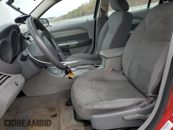 2007 Chrysler Sebring with VIN 1C3LC46K47N556477, listed as a Copart auction lot 49716675 with 103,318 mi miles and Salvage title. Bid and sale history available at DreamBid. Image 7.