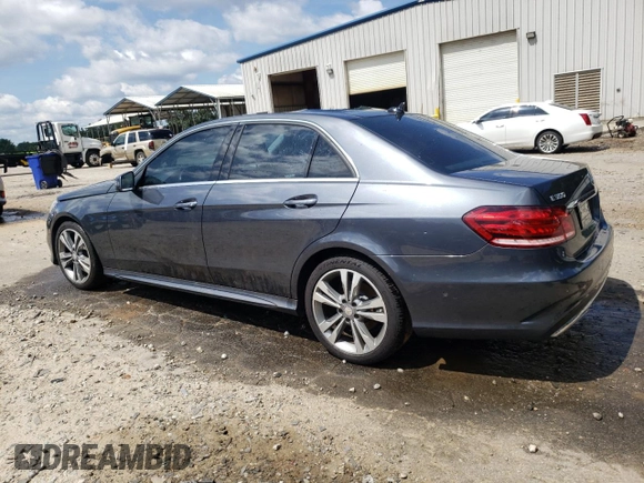 2014 Mercedes-Benz E 350 Sport with VIN WDDHF5KB7EB038257, listed as a Copart auction lot 61251595 with 110,814 mi miles and Salvage title. Bid and sale history available at DreamBid. Image 2.