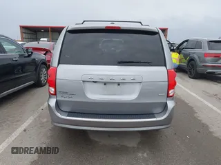 2014 Dodge Grand Caravan SXT with VIN 2C4RDGCG0ER417662, listed as a IAAI auction lot 41933279 with 156,751 mi miles and . Bid and sale history available at DreamBid. Image 16.