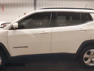 2018 Jeep Compass Altitude with VIN 3C4NJDBB2JT373179, listed as a IAAI auction lot 41753934 with 47,230 mi miles and . Bid and sale history available at DreamBid. Image 14.
