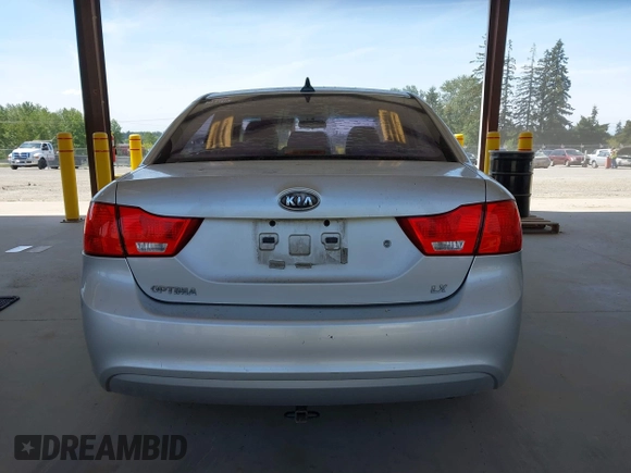 2009 Kia Optima LX z VIN KNAGE228795357008, wystawiony jako IAAI lot #42228948 z przebiegiem 148 194 mil mil oraz . Historia ofert i sprzedaży dostępna na DreamBid. Obrazek 16.
