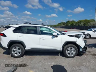 2021 Toyota RAV4 XLE with VIN 2T3W1RFV2MC102997, listed as a IAAI auction lot 41512340 with 47,238 mi miles. Bid and sale history available at carsss.com. Image 14.