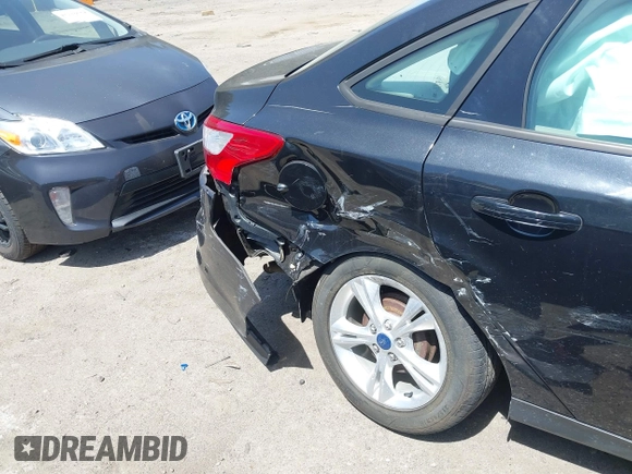 2014 Ford Focus SE with VIN 1FADP3F2XEL120830, listed as a IAAI auction lot 42082905 with 19,128 mi miles and . Bid and sale history available at DreamBid. Image 6.