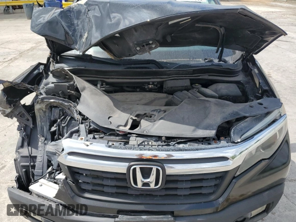 2017 Honda Ridgeline RTL with VIN 5FPYK2F51HB001058, listed as a Copart auction lot 55753865 with 113,539 mi miles and Clean title. Bid and sale history available at DreamBid. Image 11.