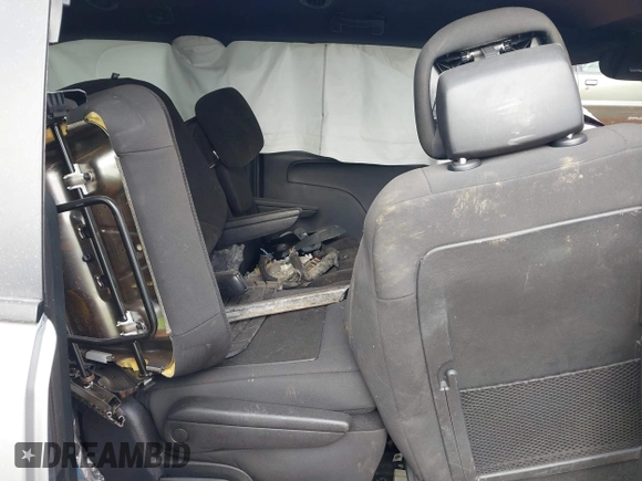 2019 Dodge Grand Caravan SE with VIN 2C4RDGBG3KR639447, listed as a IAAI auction lot 40960702 with Not Provided miles and . Bid and sale history available at DreamBid. Image 8.