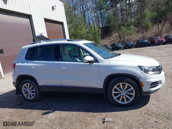 2017 Volkswagen Tiguan Wolfsburg Edition with VIN WVGSV7AX8HK001374, listed as a IAAI auction lot 42070567 with 75,834 mi miles. Bid and sale history available at carsss.com. Image 12.