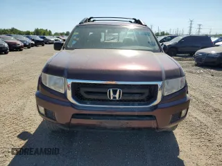 2009 Honda Ridgeline RT z VIN 5FPYK16239B106377, wystawiony jako Copart lot #70242764 z przebiegiem 187 760 mil mil oraz Czysty tytuł • Clean title. Historia ofert i sprzedaży dostępna na DreamBid. Obrazek 5.