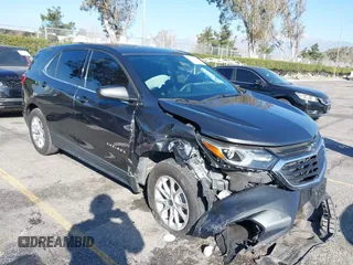 2020 Chevrolet Equinox LT with VIN 2GNAXKEV8L6266076, listed as a IAAI auction lot 41647321 with 93,387 mi miles and . Bid and sale history available at carsss.com. Image 1.