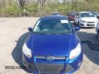 2012 Ford Focus SE z VIN 1FAHP3K28CL297610, wystawiony jako IAAI lot #41999068 z przebiegiem 164 482 mil mil oraz . Historia ofert i sprzedaży dostępna na DreamBid. Obrazek 6.