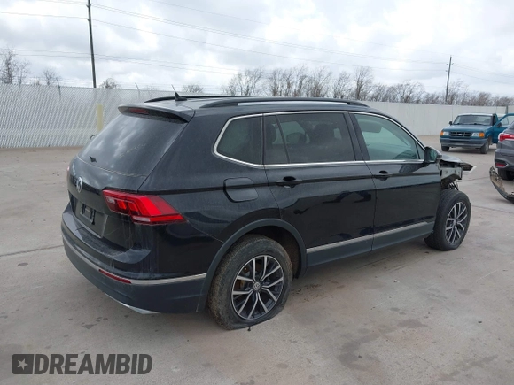 2020 Volkswagen Tiguan SE with VIN 3VV3B7AX7LM067046, listed as a IAAI auction lot 41697405 with 53,573 mi miles and . Bid and sale history available at DreamBid. Image 4.