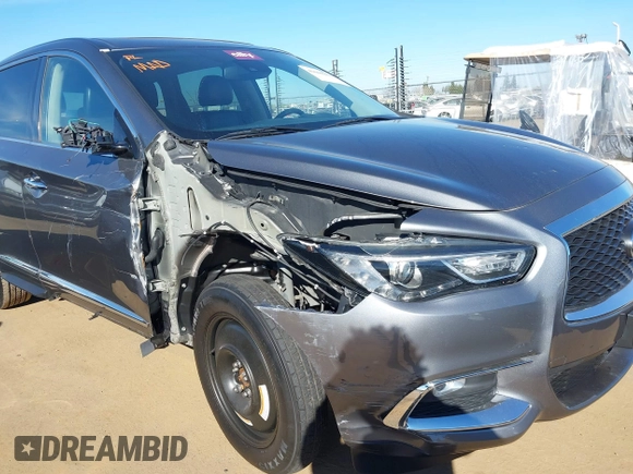 2020 Infiniti QX60 Luxe with VIN 5N1DL0MN5LC520126, listed as a IAAI auction lot 41698233 with 75,249 mi miles and . Bid and sale history available at DreamBid. Image 6.