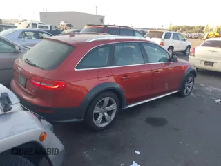 2014 Audi allroad Premium Plus with VIN WA1UFAFL1EA069928, listed as a IAAI auction lot 40558283 with 138,316 mi miles. Bid and sale history available at carsss.com. Image 4.
