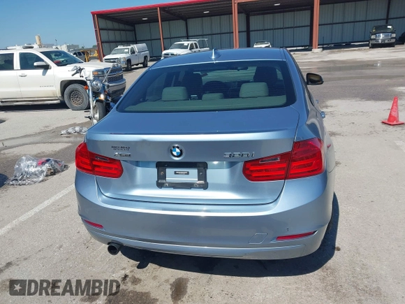 2014 BMW 3 Series 320i xDrive with VIN WBA3C3C59EF986353, listed as a IAAI auction lot 42383107 with 142,836 mi miles and . Bid and sale history available at DreamBid. Image 16.