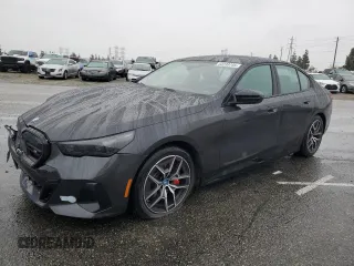 2024 BMW i5 M60 with VIN WBY43FK04RCP95184, listed as a Copart auction lot 44239745 with 6,539 mi miles and Salvage Title. Bid and sale history available at carsss.com. Image 1.