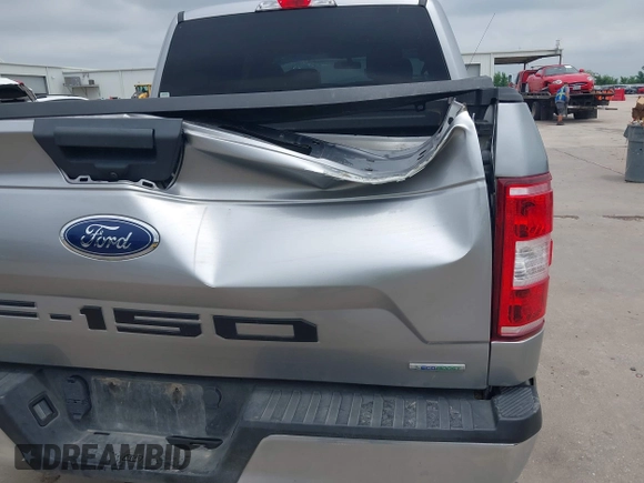 2020 Ford F-150 XL with VIN 1FTEW1EP7LFB82054, listed as a IAAI auction lot 42123655 with 72,768 mi miles and . Bid and sale history available at DreamBid. Image 18.