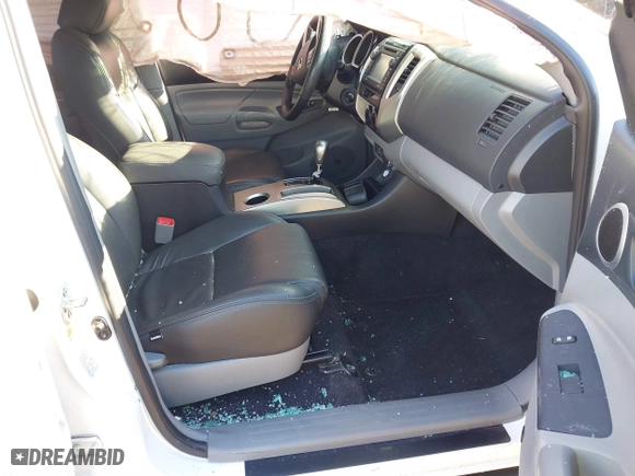 2013 Toyota Tacoma PreRunner with VIN 3TMJU4GN4DM150682, listed as a IAAI auction lot 41206289 with 66,179 mi miles. Bid and sale history available at carsss.com. Image 5.