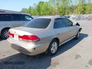 2002 Honda Accord EX z VIN 1HGCG16572A033397, wystawiony jako IAAI lot #42055022 z przebiegiem 225 073 mil mil oraz . Historia ofert i sprzedaży dostępna na DreamBid. Obrazek 4.