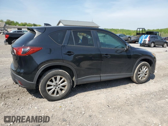 2015 Mazda CX-5 Touring with VIN JM3KE4CY6F0434538, listed as a Copart auction lot 54966145 with 209,447 mi miles and Clean Title. Bid and sale history available at DreamBid. Image 3.