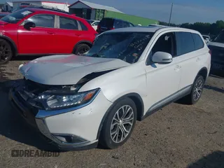 2017 Mitsubishi Outlander SE with VIN JA4AD3A39HZ024348, listed as a IAAI auction lot 42572866 with 112,372 mi miles and . Bid and sale history available at DreamBid. Image 2.